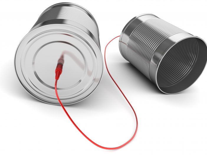 two tin cans on a red string, a children's telephone game