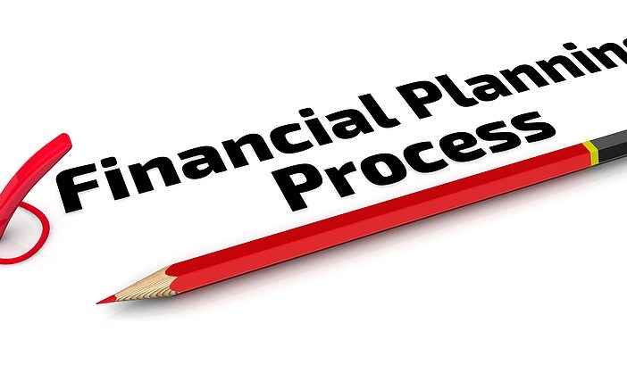 Financial Planning Process words written in black text. The Check Mark.